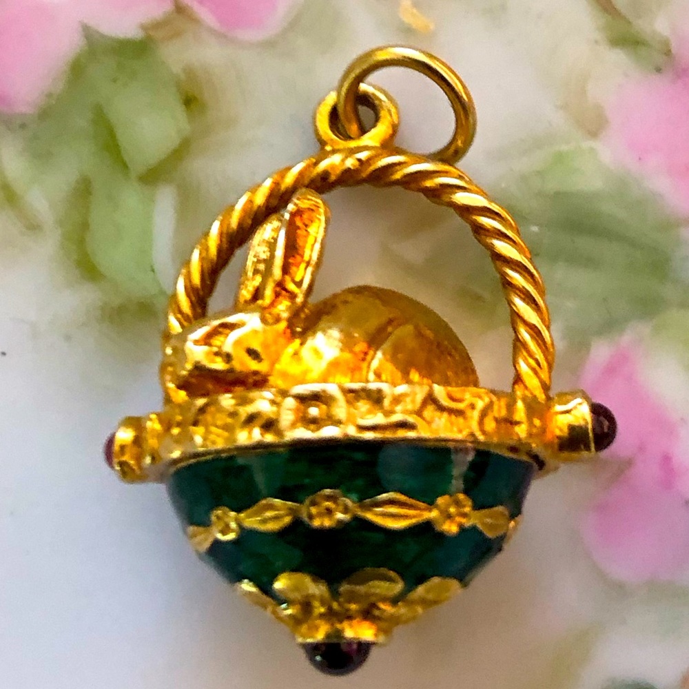 Faberge Half egg with rabbit sitting in it. Gold plated silver, green with 3 sto
